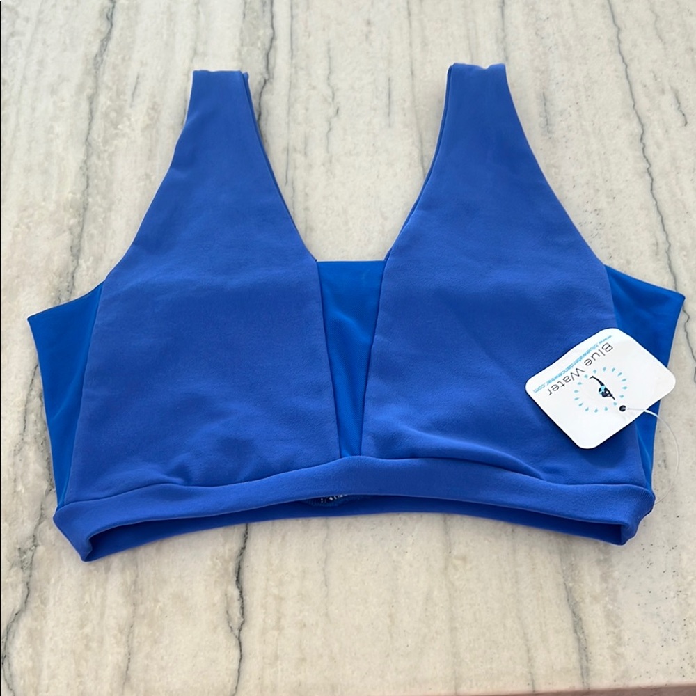 Youth X Small Blue Water dance wear top.  Royal blue with tags.  Never worn.
